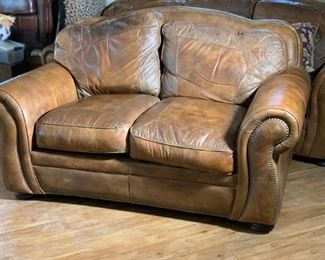 Rustic Tooled Leather Nailhead Sofa loveseat	39x67x42in	HxWxD