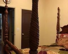 Queen sized four poster bed, brand new mattress set included. Carved detail, elegant and solid. Linens can be included if you want.