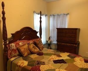 Queen sized four poster bed, brand new mattress set included. Carved detail, elegant and solid. Linens can be included if you want. Seen here with matching dresser. 