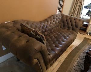 Brown leather sofa - perfectly worn and ready for the She Shed or Man Cave.   Big enough for those naps we all crave.            $300.00                                                                  92"L x 34-1/2"D x 34"H