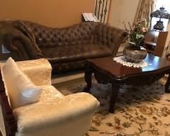 Sofa, heavy wood table $200.00 Excellent condition            28-1/2"D x 55"L