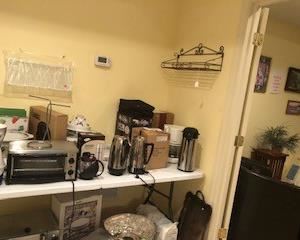 More kitchen appliances - coffee makers, toaster ovens, tea pots, shelf units, catering items, silver plated punch bowl, watermelon slicers, steamers