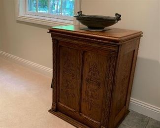 Heavily carved antique cabinet