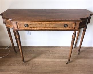 Antique console table on casters 