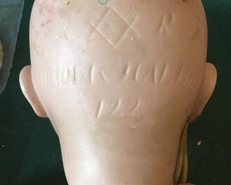 detail of bisque doll's head