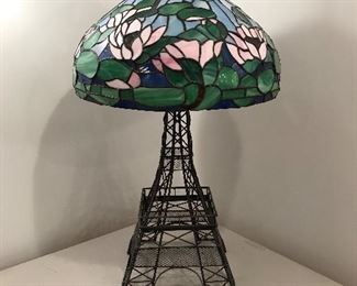 Metal Eiffel tower & stained glass lamp shade.  This is not a lamp. Items sold seperately.