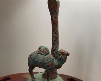 Closer view of brass camel lamp