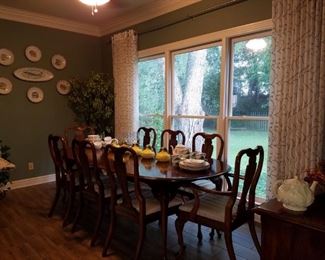Cherry dining table with eight dining chairs