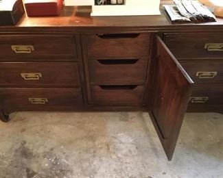 DRAWERS BEHIND CENTER DOOR