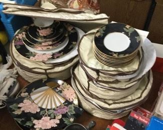 Fits &Floyd dinner ware settings for 8 fwith extra pieces used 10 times  cost over $1500. Asking $450 