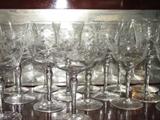 Etched and cut glass wine glasses and goblets