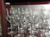 Etched and cut glass wine glasses and goblets