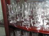 Etched and cut glass wine glasses and goblets