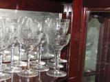 Etched and cut glass wine glasses and goblets