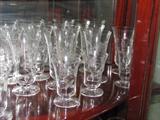 Etched and cut glass wine glasses and goblets