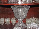 Stunning cut glass antique punch bowl with 12 cups