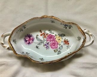 $20 Oval footed floral dish.   8.25" W, 4.25" D, 2.5" H. 