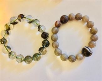 $8 each stone gray-toned beaded bracelets .  Each approx 2" diam. 