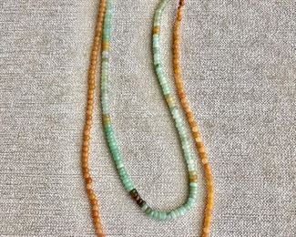 $80 Pair of stone necklaces  Green beads 17" long, Yellow beads 20 inches long 