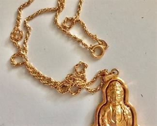 $45  Buddha medallion on gold tone chain.  Medallion approx 1.5" H, chain 18" L.  