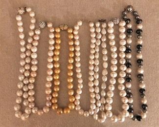 $30 Each 7 strands of pearls. Longest  18" long, mediums are 16" long, and smaller ones 14" long.  2 sets Pearls on far right SOLD  Yellow pearls in center SOLD 