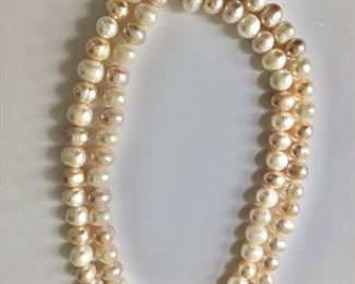 $125 Double strand 14K clasp Pearl necklace. 16" L. 