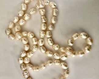 $75 Extra long individually knotted pearl necklace 34" Long
