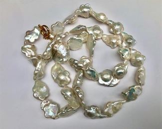 $100 Extra long irregular pearl necklace. 32" L.