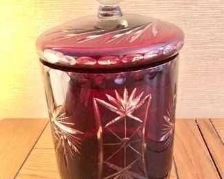 $30 Red cut glass covered canister. 10" H, 7" diam. 