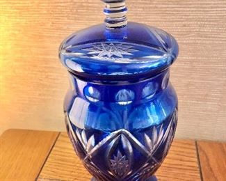 $30 Blue cut glass covered urn.  10" H. 