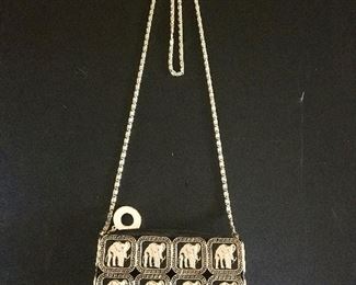 $40 Elephant purse on chain  27" L x6" W; metal over leather  