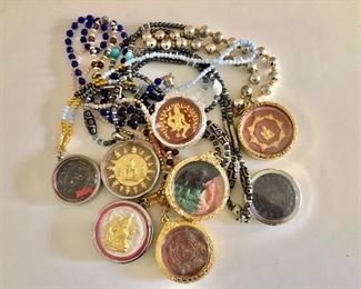 $95 Set of 8 medallions on necklaces or chains 
