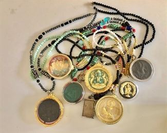 $95 Set of 8 Medallions, Amulets on chains 