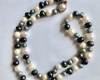 $65 Pearl necklace 28 inches long Metal clasp 