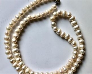 $65 Long Pearl necklace  30" Long metal clasp 