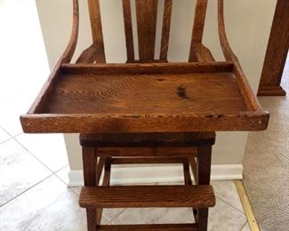 Antique tigard oak high chair.  