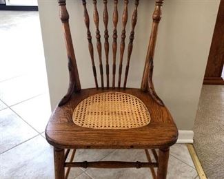 Antique caned seat oak chair. Great accent chair. Nice turned features. 