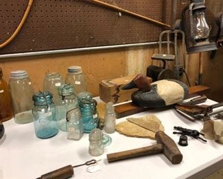 Fruit jars and old tools. Some quite unusual pieces. 