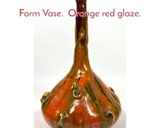 Lot 47 MARCELLO FANTONI Bottle Form Vase. Orange red glaze.