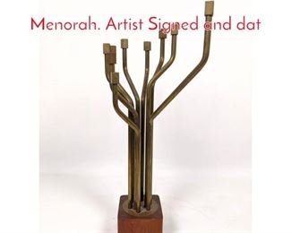 Lot 59 Modernist Brass and Wood Menorah. Artist Signed and dat