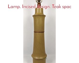 Lot 116 Tall 2 Part MARTZ Table Lamp. Incised design. Teak spac