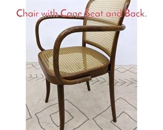 Lot 619 STENDIG Bent Wood Arm Chair with Cane Seat and Back. 