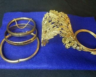 5 gold like bracelets