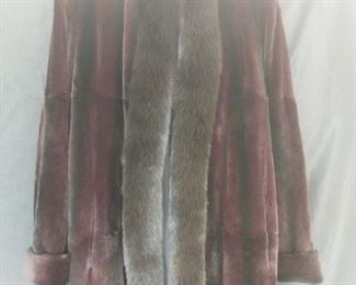 Alaskan customized built furs Reversible mink coat with Fox collar the mink is a dark burgundy color with black overtones with black fox collar size S