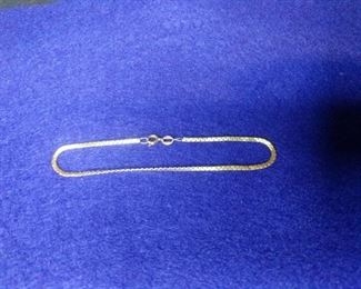 gold bracelet stamped 14k.