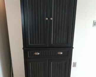 Grosly black wooden storage cabinet 30 by 16 by 72 inches high