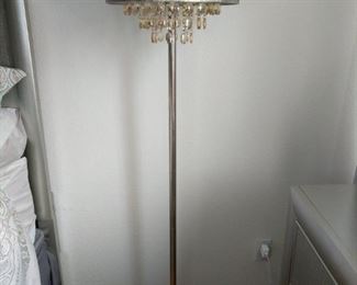 one floor lamp and one matching end table lamp floor lamp is 64 inches high end table lamp is 30 in high