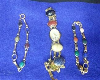 one watch and two bracelets