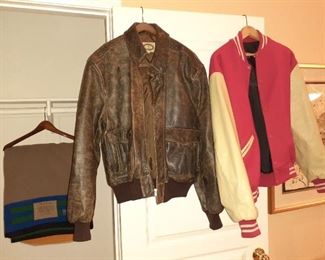 Letterman Jacket from  movie set "Flamingo Rising"

Leather jacket worn by Hardy Boy Parker Stevenson in a show called "probe"

Hanging behind is blanket from " lost child" used by Mercedes Ruehl