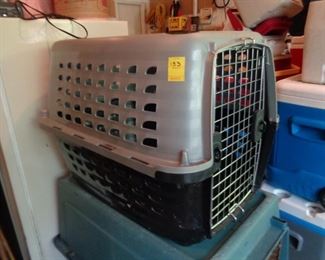 One of three dog crates